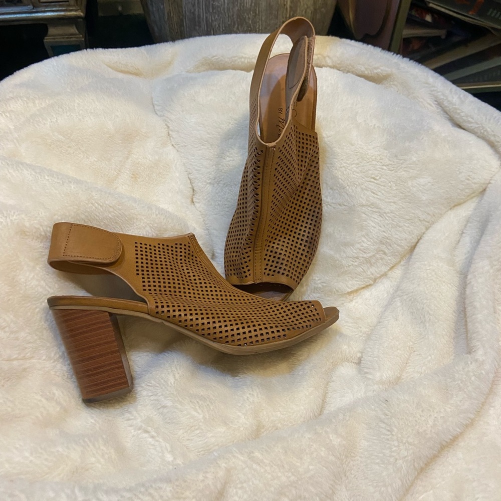 Brown Perforated heels by Mattise for sale